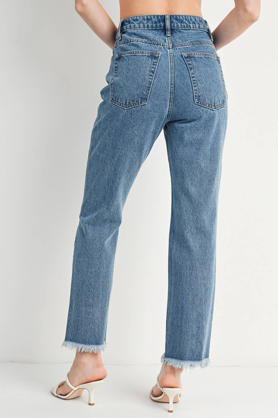 HIGH RISE STRAIGHT LEG DISTRESSED RAW HEM JEANS