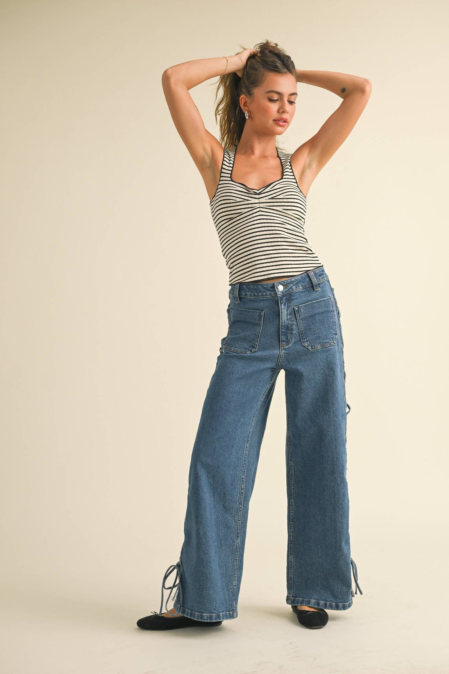 STRIPED KNITTED TOP WITH MERROW END